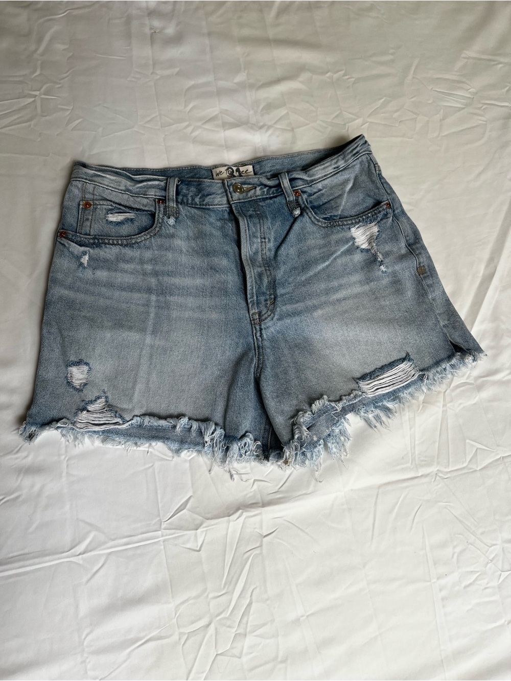 We The Free Light Wash Distressed Denim Cutoff Shorts